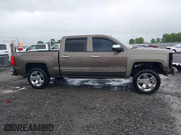 2014 Chevrolet Silverado 1500 LTZ with VIN 3GCUKSEC6EG167024, listed as a IAAI auction lot 42337467 with 198,721 mi miles and . Bid and sale history available at DreamBid. Image 14.
