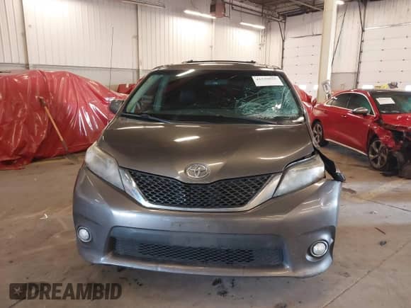 2011 Toyota Sienna SE with VIN 5TDXK3DC7BS034516, listed as a IAAI auction lot 41539955 with 209,309 mi miles and . Bid and sale history available at DreamBid. Image 12.
