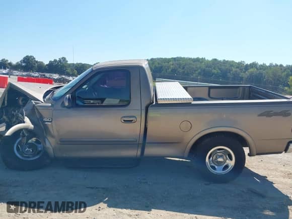 2002 Ford F-150 XL with VIN 1FTRF18W72NA62845, listed as a IAAI auction lot 43184005 with Not provided miles and . Bid and sale history available at DreamBid. Image 14.