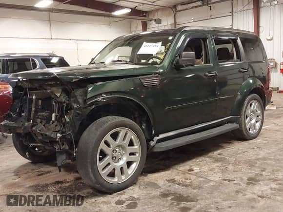 2010 Dodge Nitro Heat with VIN 1D4PT4GK1AW156988, listed as a IAAI auction lot 42415484 with 160,084 mi miles and . Bid and sale history available at DreamBid. Image 2.