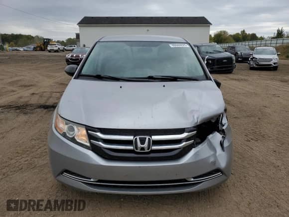 2016 Honda Odyssey LX with VIN 5FNRL5H26GB103453, listed as a Copart auction lot 86080625 with 97,833 mi miles and Salvage title. Bid and sale history available at DreamBid. Image 5.