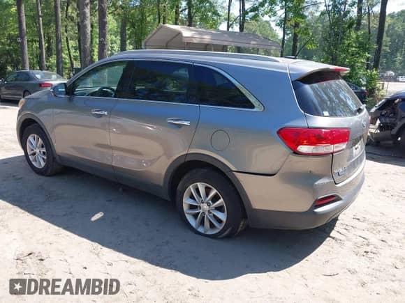 2018 Kia Sorento LX with VIN 5XYPG4A53JG394391, listed as a IAAI auction lot 42391459 with 119,046 mi miles and . Bid and sale history available at DreamBid. Image 3.