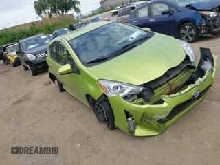 2015 Toyota Prius One z VIN JTDKDTB3XF1114693, wystawiony jako IAAI lot #42996270 z przebiegiem 116 438 mil mil oraz . Historia ofert i sprzedaży dostępna na DreamBid. Obrazek 1.