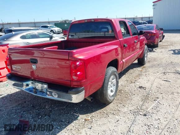 2006 Dodge Dakota SLT with VIN 1D7HE48K56S653864, listed as a IAAI auction lot 42194728 with 198,221 mi miles and . Bid and sale history available at DreamBid. Image 4.
