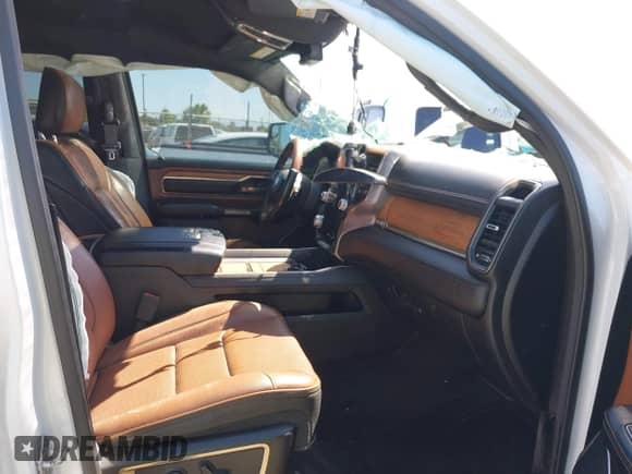 2020 Ram 1500 Longhorn with VIN 1C6SRFKM9LN229373, listed as a IAAI auction lot 42246047 with 134,671 mi miles and . Bid and sale history available at DreamBid. Image 5.