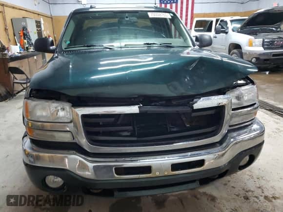 2004 GMC Sierra 1500 SLT z VIN 2GTEK19T941194072, wystawiony jako Copart lot #70002765 z przebiegiem 165 447 mil mil oraz Szkoda całkowita • Salvage title. Historia ofert i sprzedaży dostępna na DreamBid. Obrazek 5.