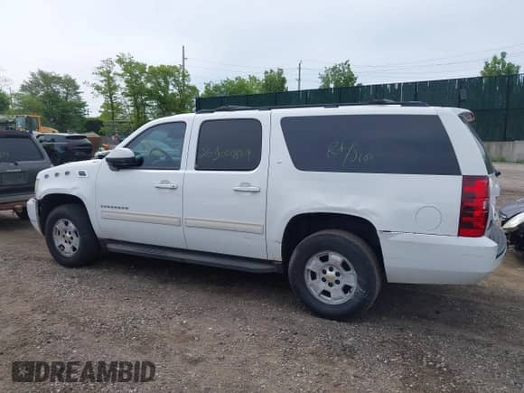 2010 Chevrolet Suburban LT with VIN 1GNUKJE31AR158534, listed as a IAAI auction lot 42250669 with Not provided miles and . Bid and sale history available at DreamBid. Image 13.
