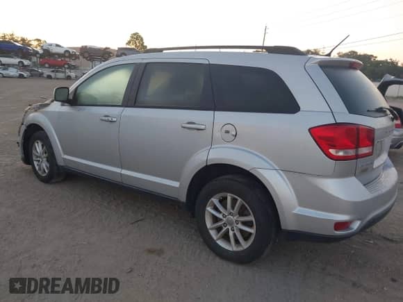 2014 Dodge Journey SXT with VIN 3C4PDCBGXET187188, listed as a IAAI auction lot 43275941 with Not provided miles and . Bid and sale history available at DreamBid. Image 3.