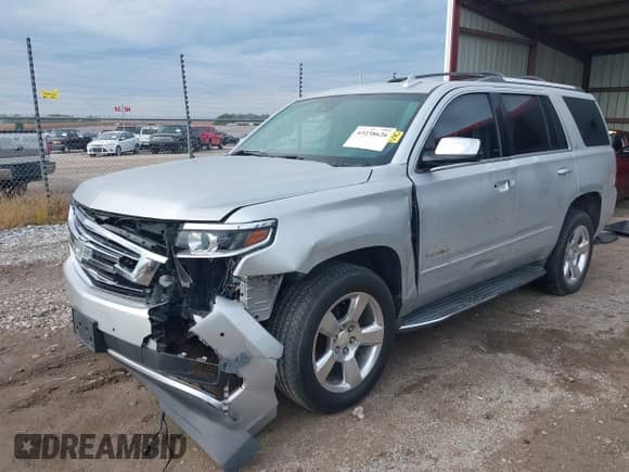 2015 Chevrolet Tahoe LTZ with VIN 1GNSKCKC8FR564678, listed as a IAAI auction lot 43238626 with 161,656 mi miles and . Bid and sale history available at DreamBid. Image 17.