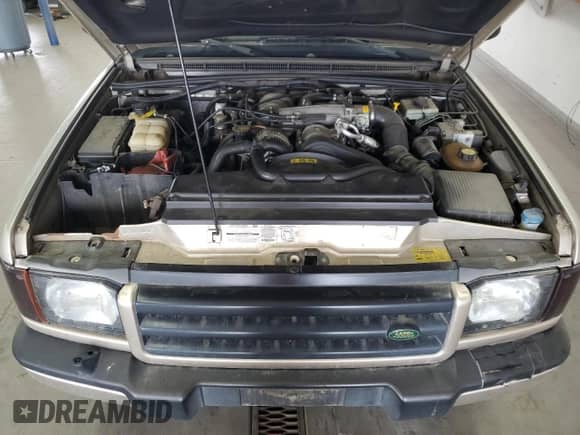 2000 Land Rover Discovery Cloth with VIN SALTY1541YA261319, listed as a Copart auction lot 86040445 with 153,917 mi miles and Clean title. Bid and sale history available at DreamBid. Image 12.