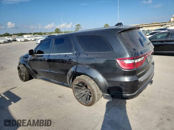 2014 Dodge Durango R/T with VIN 1C4SDHCT4EC414356, listed as a Copart auction lot 81507045 with 263,469 mi miles and Salvage title. Bid and sale history available at DreamBid. Image 2.