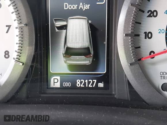 2015 Toyota Sienna SE with VIN 5TDXK3DC9FS669405, listed as a IAAI auction lot 42590910 with 82,127 mi miles and . Bid and sale history available at DreamBid. Image 16.