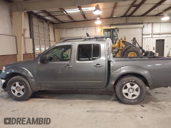2006 Nissan Frontier LE with VIN 1N6AD07U76C414981, listed as a IAAI auction lot 41536352 with 217,560 mi miles and . Bid and sale history available at DreamBid. Image 15.