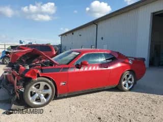 2012 Dodge Challenger R/T Plus with VIN 2C3CDYBT7CH275294, listed as a Copart auction lot 68942055 with 175,094 mi miles and Salvage title. Bid and sale history available at DreamBid. Image 1.