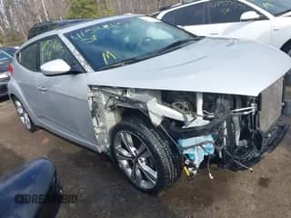 2017 Hyundai Veloster with VIN KMHTC6AD2HU324740, listed as a IAAI auction lot 41574415 with 66,685 mi miles and . Bid and sale history available at DreamBid. Image 1.