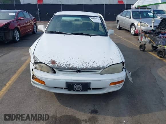 1996 Toyota Camry LE z VIN 4T1BF12K1TU871333, wystawiony jako IAAI lot #42295901 z przebiegiem 196 769 mil mil oraz . Historia ofert i sprzedaży dostępna na DreamBid. Obrazek 11.