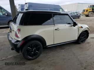 2013 MINI Hardtop with VIN WMWSU3C51DT691076, listed as a Copart auction lot 48066455 with 143,002 mi miles and Salvage title. Bid and sale history available at DreamBid. Image 3.