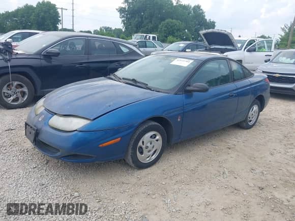 2002 Saturn SC with VIN 1G8ZN12802Z237999, listed as a IAAI auction lot 42573764 with 243,398 mi miles and . Bid and sale history available at DreamBid. Image 2.