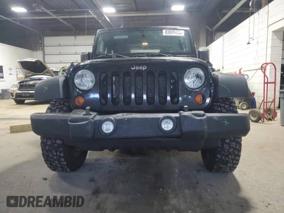 2012 Jeep Wrangler Sport z VIN 1C4AJWAG4CL108575, wystawiony jako Copart lot #83809455 z przebiegiem 180 514 mil mil oraz Szkoda całkowita • Salvage title. Historia ofert i sprzedaży dostępna na DreamBid. Obrazek 5.