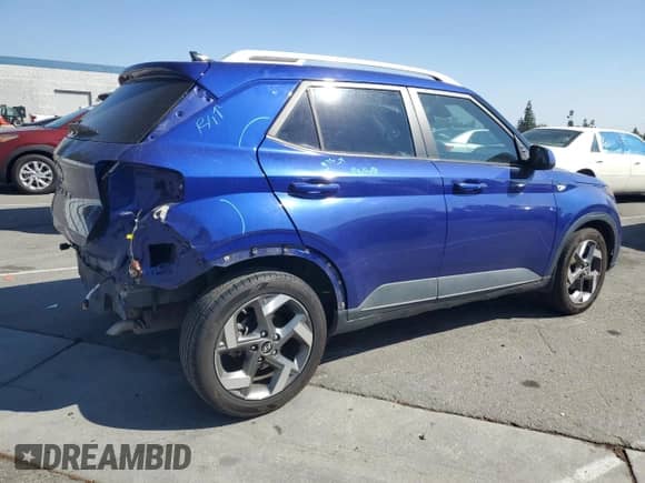 2021 Hyundai Venue Denim with VIN KMHRC8A3XMU120288, listed as a Copart auction lot 82322955 with 86,055 mi miles and Salvage title. Bid and sale history available at DreamBid. Image 3.