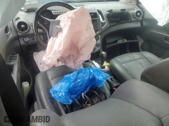 2015 Chevrolet Sonic LTZ с VIN 1G1JE5SB1F4130638, выставлен на аукционе Copart как лот 84034965 с пробегом Не указан миль и Списание • Salvage title. История ставок и продаж доступна на DreamBid. Изображение 8.