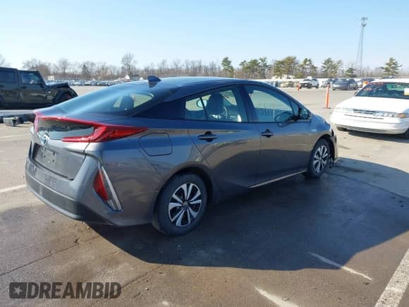2018 Toyota Prius Plus z VIN JTDKARFP9J3072801, wystawiony jako IAAI lot #41741739 z przebiegiem 80 953 mil mil oraz . Historia ofert i sprzedaży dostępna na DreamBid. Obrazek 4.