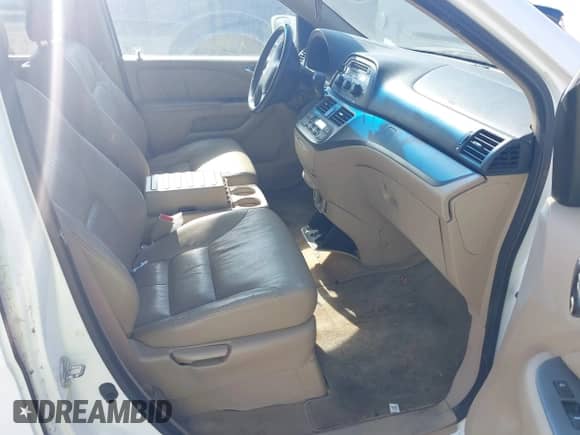 2007 Honda Odyssey EX-L z VIN 5FNRL38677B435716, wystawiony jako IAAI lot #43376334 z przebiegiem 253 875 mil mil oraz . Historia ofert i sprzedaży dostępna na DreamBid. Obrazek 5.