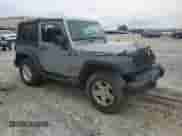 2013 Jeep Wrangler Sport with VIN 1C4AJWAGXDL622030, listed as a Copart auction lot 68867905 with 226,330 mi miles and Salvage title. Bid and sale history available at DreamBid. Image 4.