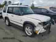 2004 Land Rover Discovery SE with VIN SALTY19474A846653, listed as a Copart auction lot 59087945 with 93,774 mi miles and Salvage title. Bid and sale history available at DreamBid. Image 4.