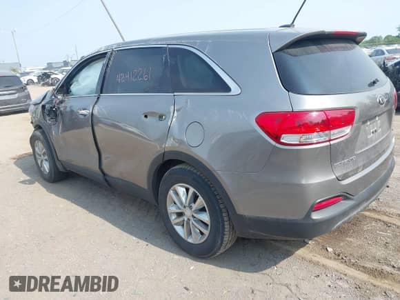 2018 Kia Sorento LX with VIN 5XYPG4A3XJG430706, listed as a IAAI auction lot 42412261 with 64,415 mi miles and . Bid and sale history available at DreamBid. Image 3.