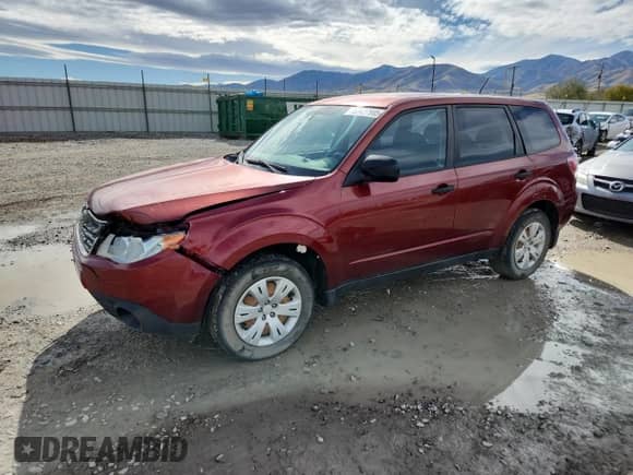 2009 Subaru Forester X with VIN JF2SH61679H774012, listed as a Copart auction lot 82427905 with 216,403 mi miles and Salvage title. Bid and sale history available at DreamBid. Image 1.
