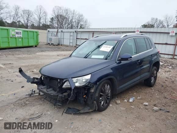 2011 Volkswagen Tiguan S with VIN WVGAV7AX7BW527670, listed as a IAAI auction lot 41189707 with 155,282 mi miles and . Bid and sale history available at DreamBid. Image 2.