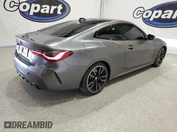 2021 BMW 4 Series 430i z VIN WBA53AP01MCG52316, wystawiony jako Copart lot #71084555 z przebiegiem 32 046 mil mil oraz Czysty tytuł • Clean title. Historia ofert i sprzedaży dostępna na DreamBid. Obrazek 3.