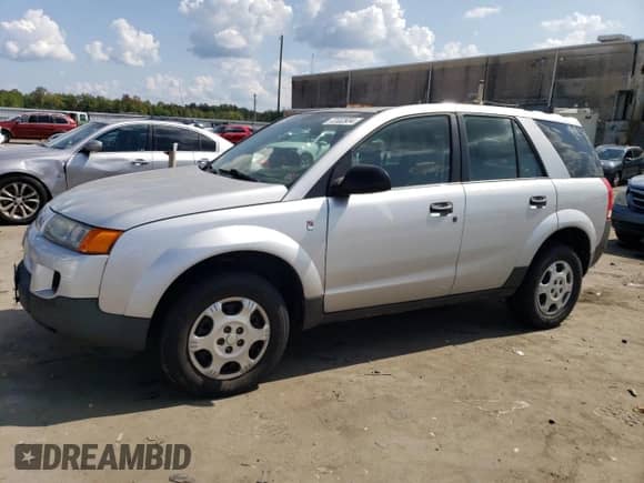2003 Saturn VUE with VIN 5GZCZ43D63S897678, listed as a Copart auction lot 72332934 with 92,557 mi miles and Salvage title. Bid and sale history available at DreamBid. Image 1.