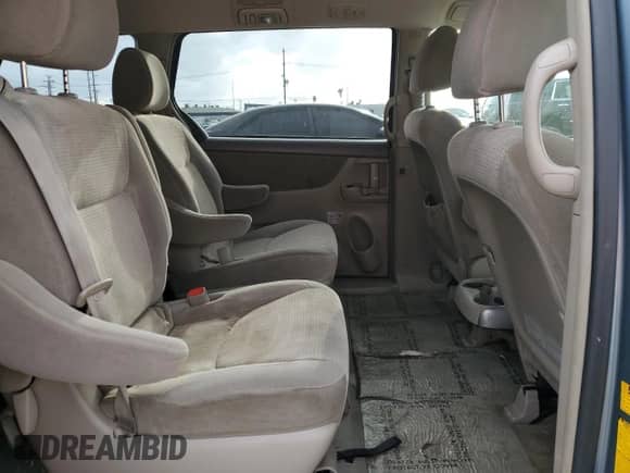 2010 Toyota Sienna CE z VIN 5TDKK4CC9AS341928, wystawiony jako Copart lot #86047675 z przebiegiem 169 006 mil mil oraz Szkoda całkowita • Salvage title. Historia ofert i sprzedaży dostępna na DreamBid. Obrazek 11.