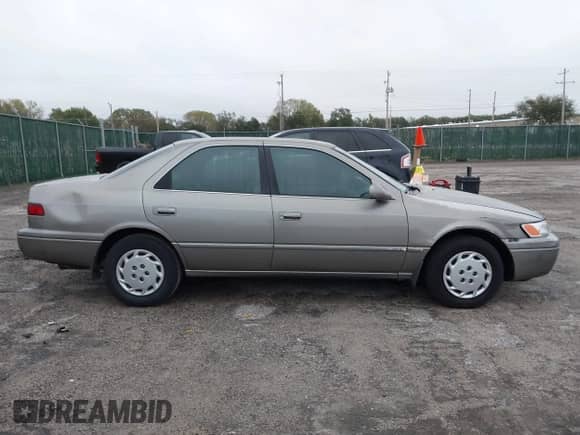 1997 Toyota Camry LE with VIN 4T1BG22K3VU065483, listed as a IAAI auction lot 43510049 with 177,848 mi miles and . Bid and sale history available at DreamBid. Image 13.