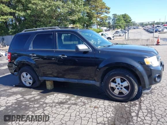 2011 Ford Escape XLT с VIN 1FMCU9DGXBKB69331, выставлен на аукционе IAAI как лот 43346798 с пробегом 231 571 миль миль и . История ставок и продаж доступна на DreamBid. Изображение 14.