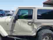 2018 Jeep Wrangler Sahara with VIN 1C4AJWBGXJL811092, listed as a IAAI auction lot 42305620 with 41,021 mi miles and . Bid and sale history available at DreamBid. Image 14.