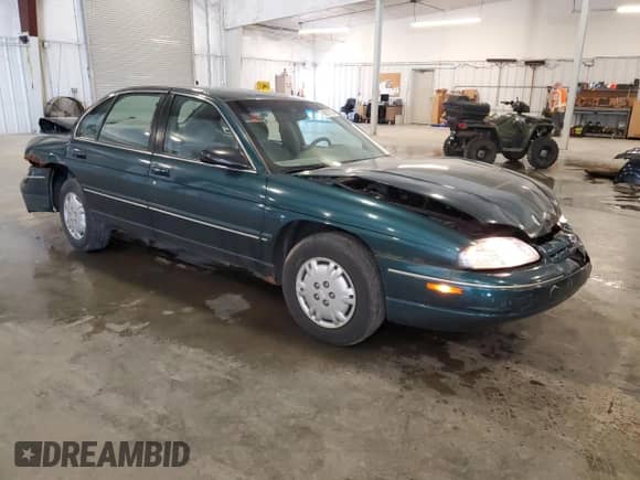 2001 Chevrolet Lumina z VIN 2G1WL52J311159761, wystawiony jako Copart lot #69700135 z przebiegiem 93 594 mil mil oraz Szkoda całkowita • Salvage title. Historia ofert i sprzedaży dostępna na DreamBid. Obrazek 4.