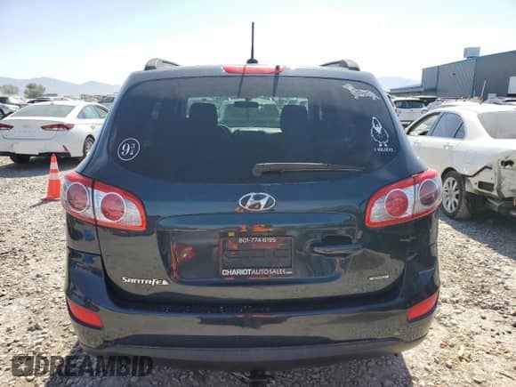 2012 Hyundai Santa Fe GLS с VIN 5XYZGDAG7CG159196, выставлен на аукционе Copart как лот 62747305 с пробегом 175 156 миль миль и Списание • Salvage title. История ставок и продаж доступна на DreamBid. Изображение 6.