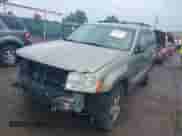 2006 Jeep Grand Cherokee Laredo z VIN 1J4HR48N46C259964, wystawiony jako IAAI lot #42698023 z przebiegiem 201 624 mil mil oraz . Historia ofert i sprzedaży dostępna na DreamBid. Obrazek 2.