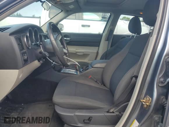 2006 Dodge Charger with VIN 2B3KA43GX6H444188, listed as a Copart auction lot 62875494 with 98,826 mi miles and Salvage title. Bid and sale history available at DreamBid. Image 7.