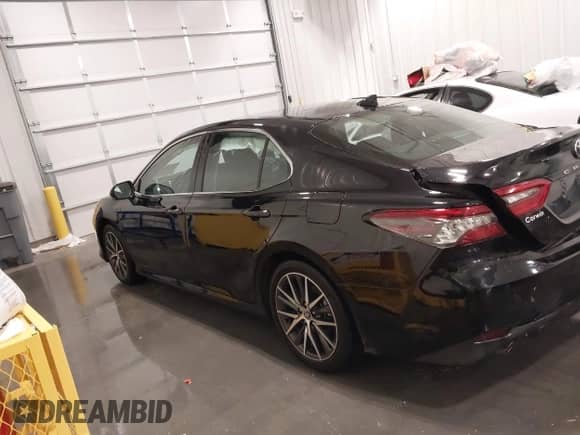 2023 Toyota Camry Hybrid XLE z VIN 4T1F31AK5PU611888, wystawiony jako IAAI lot #41304654 z przebiegiem 40 140 mil mil oraz . Historia ofert i sprzedaży dostępna na DreamBid. Obrazek 14.