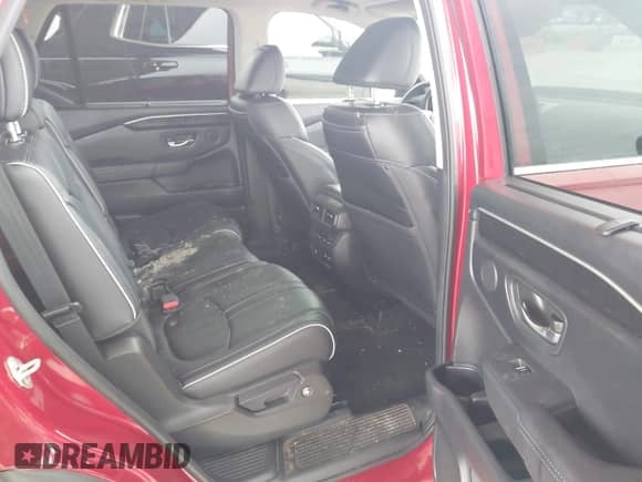 2023 Honda Pilot Elite z VIN 5FNYG1H84PB039720, wystawiony jako IAAI lot #42429896 z przebiegiem 37 988 mil mil oraz . Historia ofert i sprzedaży dostępna na DreamBid. Obrazek 8.