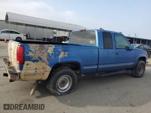 1997 Chevrolet Silverado 2500 z VIN 1GCGK29R0VE248443, wystawiony jako Copart lot #85760024 z przebiegiem 295 798 mil mil oraz Czysty tytuł • Clean title. Historia ofert i sprzedaży dostępna na DreamBid. Obrazek 3.