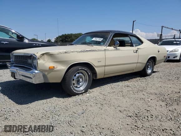 1974 Dodge Dart with VIN LL29G4G161469, listed as a Copart auction lot 70427355 with 32,658 mi miles and Salvage title. Bid and sale history available at DreamBid. Image 1.