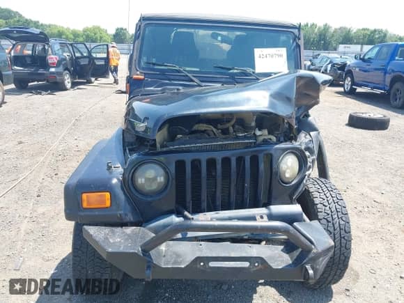 2006 Jeep Wrangler Sport z VIN 1J4FA49S16P784119, wystawiony jako IAAI lot #42470790 z przebiegiem Nie podano mil oraz . Historia ofert i sprzedaży dostępna na DreamBid. Obrazek 6.