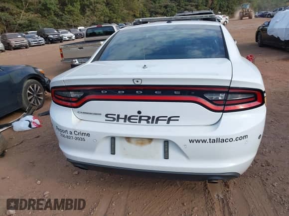 2021 Dodge Charger Police with VIN 2C3CDXATXMH663181, listed as a IAAI auction lot 43233928 with 82,341 mi miles and . Bid and sale history available at DreamBid. Image 16.