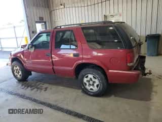 2002 Chevrolet Blazer LS с VIN 1GNDT13W62K198175, выставлен на аукционе Copart как лот 71952095 с пробегом 130 525 миль миль и Списание • Salvage title. История ставок и продаж доступна на DreamBid. Изображение 2.