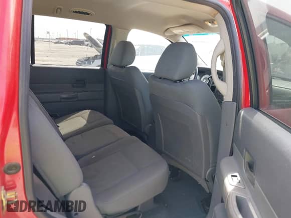 2005 Dodge Durango SXT with VIN 1D4HD38N45F570048, listed as a IAAI auction lot 41802569 with 187,135 mi miles and . Bid and sale history available at DreamBid. Image 8.